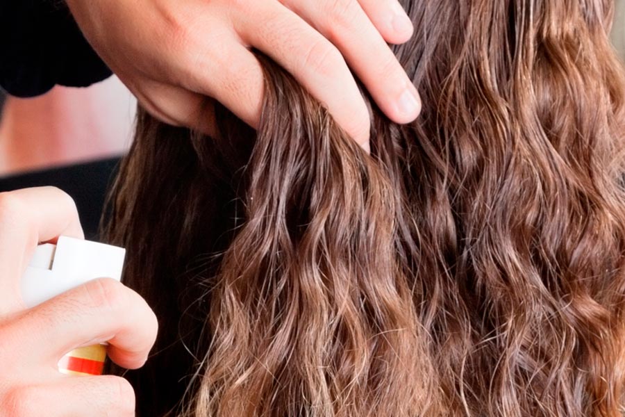 An example of hairdressing product over curly hairs