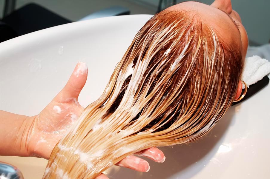 Applying hair conditioner